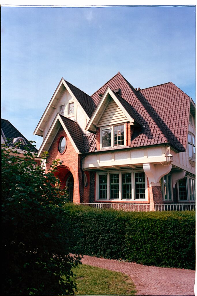 Licensed stock photograph of a house exterior; illustrative property, not a Covenant client or claim.